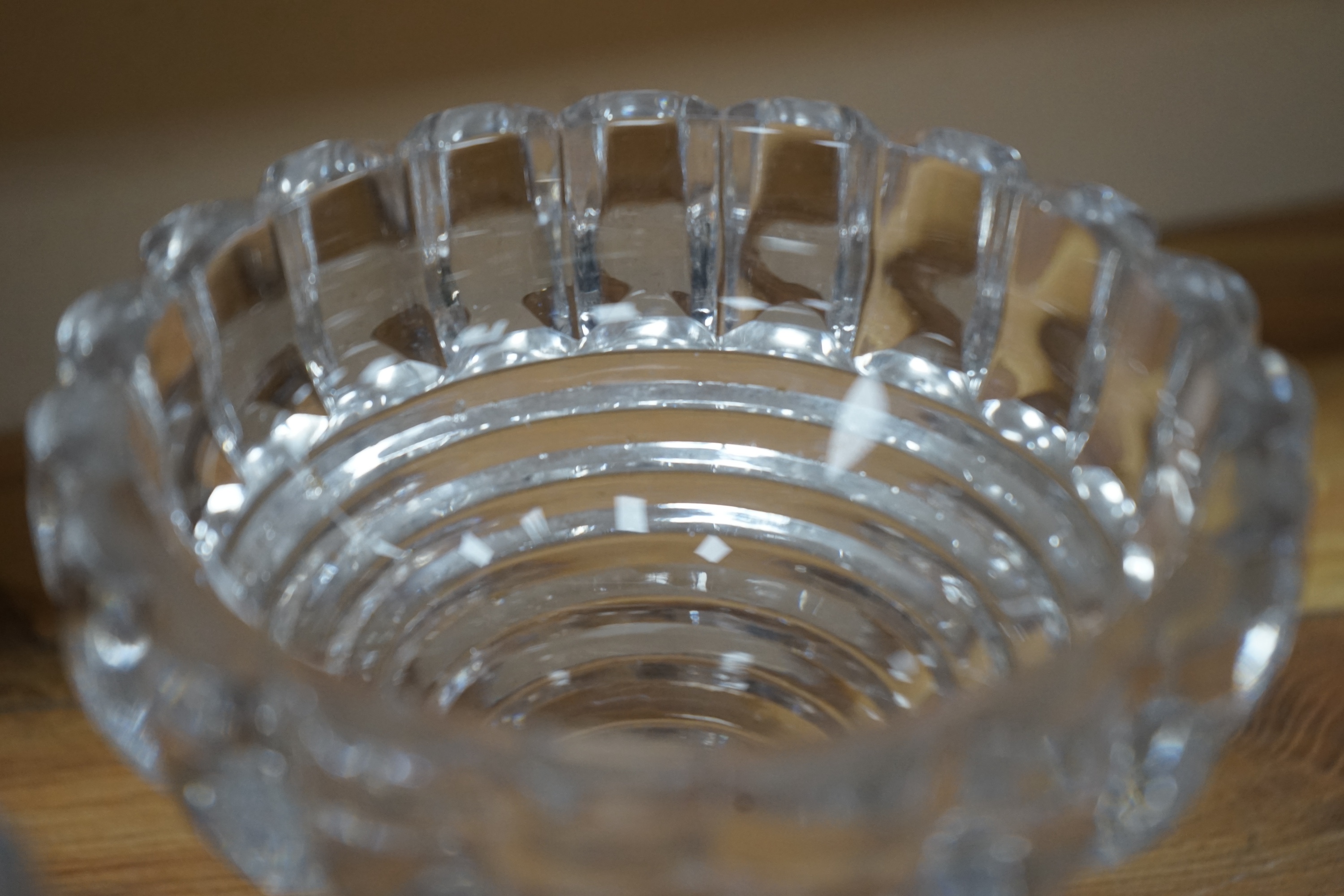 A set of three Regency cut glass pineapple stands, 19cm. Condition - several chips